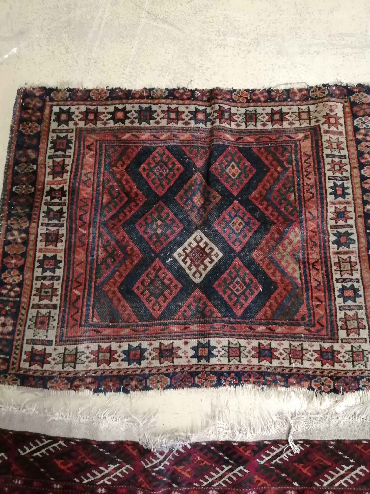 A Bokhara rug together with a Caucasian prayer mat, larger 150 x 104cm